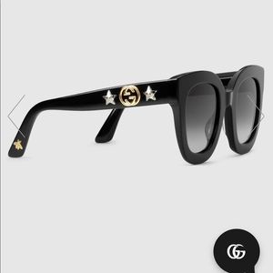 Round-frame acetate sunglasses with star